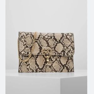 Topshop Bags | Topshop Panther Clutch | Color: Tan